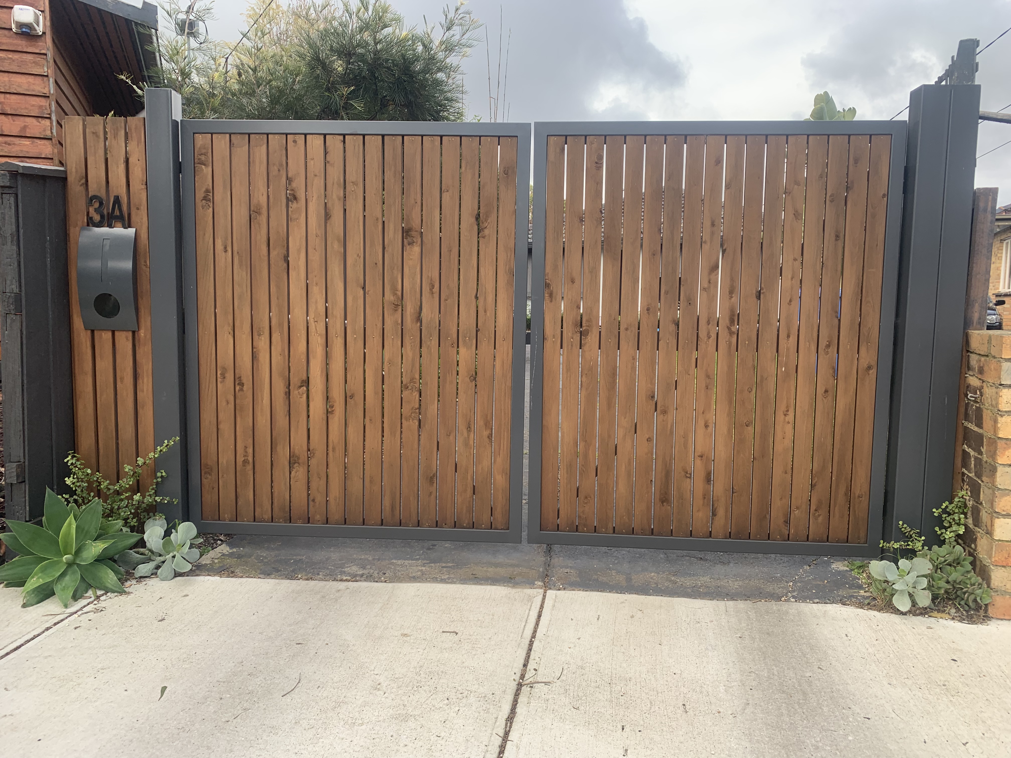 Timber shop front gate